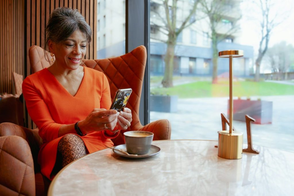 Woman using a smartphone at a table